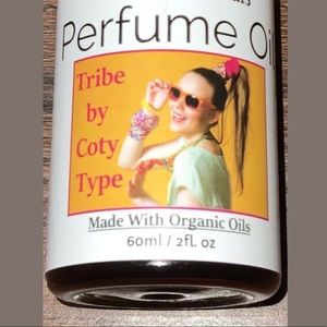 TRIBE PRFM OIL BN IN ATOMIZER THAT HOLDS 8 ML.